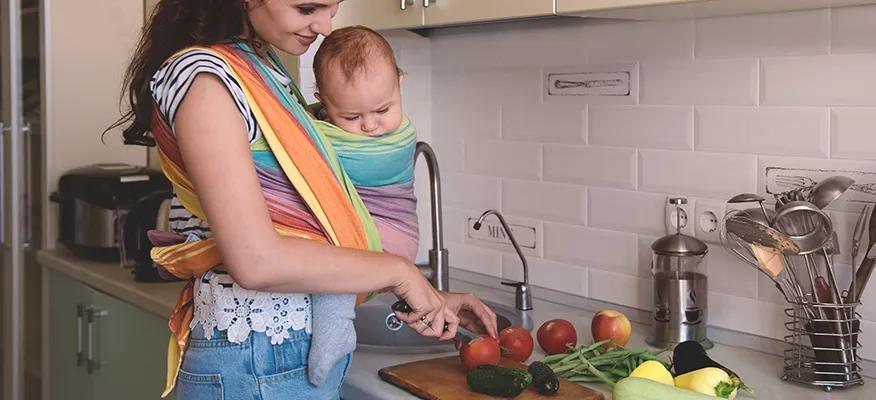 Breastfeeding mother with healthy food choices - fruits, vegetables, lean meat, eggs, beans, lentils, and whole grains